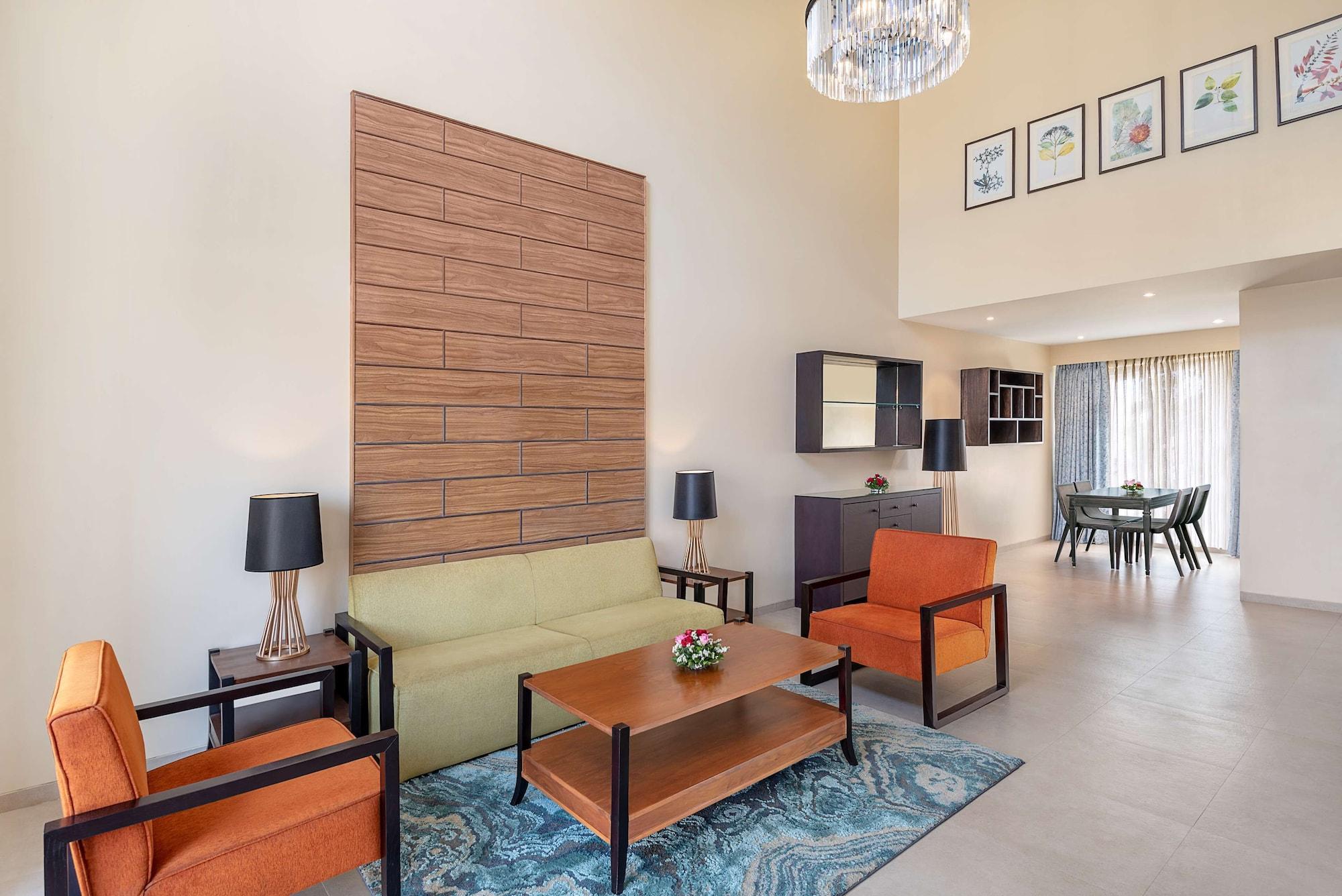 Radisson Blu Plaza Resort & Convention Centre Karjat Exterior foto Living room